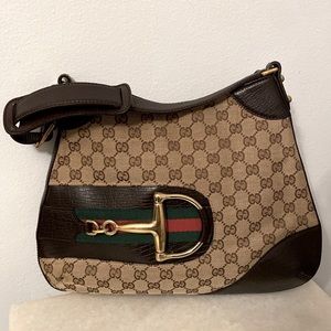 Gucci authentic vintage shoulder purse brown with gold hardware.